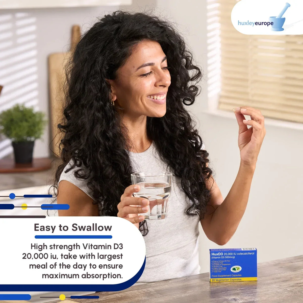 A smiling woman holding a vitamin capsule and a glass of water, with a HuxD3 Vitamin D3 box.